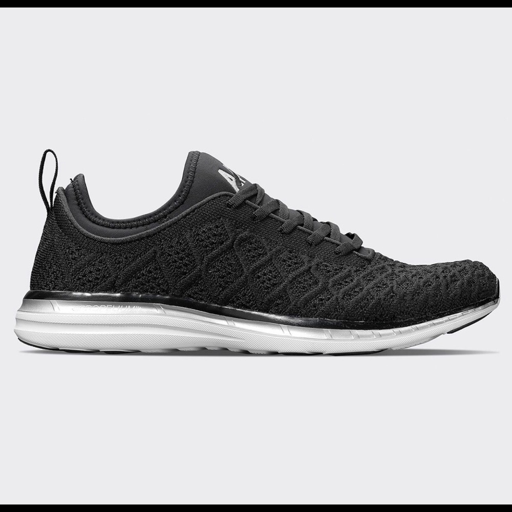 Black APL tennis shoes